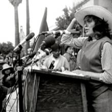 Dolores Huerta speaks to farm workers in Sacramento, California after a 300-mile march on foot from Delano