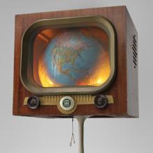 The World is on Television Today  c. 1987 Mickey McGowan (b. 1946) television cabinet, globe, lighting, stand Courtesy of Mickey McGowan, Unknown Museum Archives L2023.0301.056a-b
