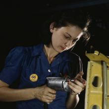Assembling a wing section for a North American P-51 Mustang fighter plane at the North American Aviation plant