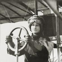 Julia Clark (1880–1912) at the controls of a Curtiss biplane  c. 1912	
