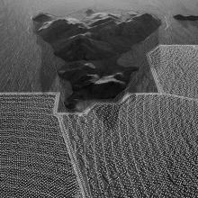 #9499, a hill formation rises above the alluvial slope at the eastern boundaries of units 2 and 3 with heliostat (mirror) installation complete  2013