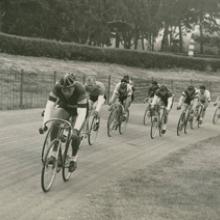 Riders jockey for position in the final sprint, Golden Gate Park Polo Field  San Francisco  1950s