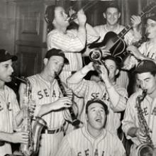 Seals players posing with instruments at the Palace Hotel 