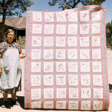 Mrs. Stagg with state quilt, Pie Town, New Mexico  1940