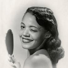 Hair model for an unknown Madam C. J. Walker hair product advertisement | Hair model for a Glossine advertisement 