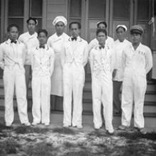 Pan American Airways Inn staff at Midway Island, from left to right back row: Guittierez Lorenzo, Jose Anderson, unknown, Jose Jesus, front row: Juan Concepcion, Vicente Van Pat, Francisco Valenzuela, Vicente Rivera, Juan Taijito c. 1937 