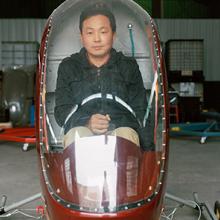 He Dongbiao sits inside his helicopter Low Altitude Free Man, which utilizes an MZ202 aeromotor. It took him one year to construct and flies as high as 1,300 feet  2015