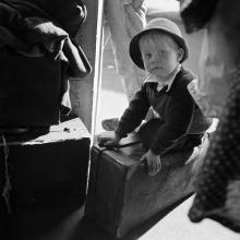 Small boy waiting for the bus in Chattanooga, Tennessee  1943