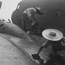 CNAC ground crew fueling Douglas C-47 (DC-3), Suifu  1944