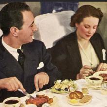 Meal service aboard a United Air Lines DC-3 Mainliner (postcard from United Air Lines stewardess Helene Dessiaume’s scrapbook)  late 1930s