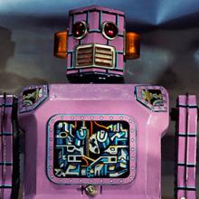 1950­s Purple tin wind-up robot  1986