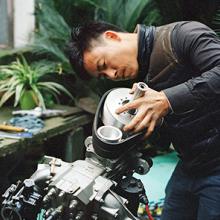 Wang Qiang refits the engine for his airplane in his backyard in Cixi, Zhejiang Province  2015