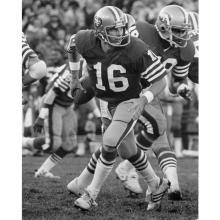 Quarterback Joe Montana rolls out to his right during a 17-10 victory over the New York Giants at Candlestick Park  November 29, 1981