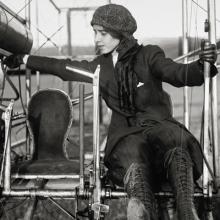 Katherine Stinson (1891–1977) preparing a Wright Model B biplane for take-off  c. 1913