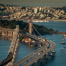 Lifter places deck section 