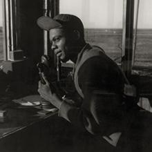 Sgt. William P. Bostic, 332nd Fighter Group, in the control tower  March 1945