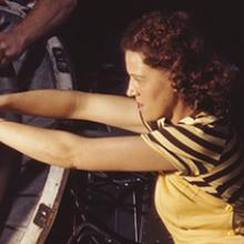 Work on a Pratt & Whitney R-1830 Twin Wasp aircraft engine mounted on a Douglas C-47 Dakota military transport