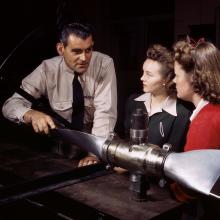 Ralph Angar, instructor, explains propeller characteristics to students in an aeronautics class, Los Angeles, California  1942