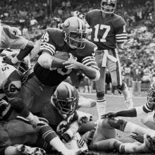 Running back Paul Hofer dives for a touchdown during a 20-26 loss to the Los Angeles Rams at Candlestick Park