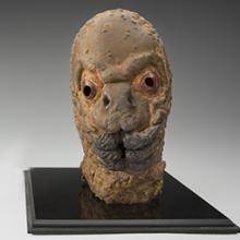 The Mole People prop hand and head