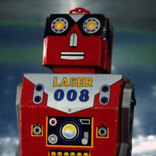 1960 “Laser” tin wind-up robot, Japan  1991