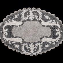 Doily with dolphin theme  early 1900s crochet lace Orvieto, Italy Collection of Lacis Museum of Lace and Textiles, Berkeley, CA JHE29502 L2013.3501.040