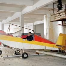 Jin Shaozhi shows off the Sky Horse, a fixed-wing aircraft with a steel frame, aluminum tubing, and a Rotax 447 motor  2015