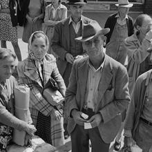 Passengers waiting to get on the Greyhound bus at Rome, Georgia  1943