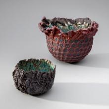 Vessel (#2479)  2012 June Schwarcz (b. 1918) electroplated copper foil, blue enamel interior, oxidized exterior L2013.2601.093.04  Vessel (#547)  1969 June Schwarcz (b. 1918) electroformed copper foil, plique-à-jour enamel, naturally oxidized copper exterior L2013.2601.033