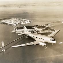 United Air Lines DC-3 over the Bay Bridge  c. 1940