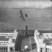 Lincoln Beachey performing in his biplane over the Panama-Pacific International Exposition grounds, San Francisco  December 25, 1913