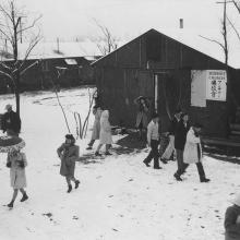 People leaving a Buddhist church during the wintertime  1943