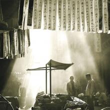 In a Chinese Street  1964 Fan Ho (b. 1937) black-and-white photograph Courtesy of Modernbook Gallery, San Francisco L2014.1710.010