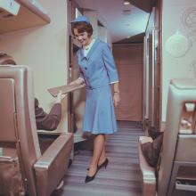 United Air Lines stewardess in uniform by Travilla  1965