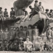 Archbold Expedition members and New Guineans pose with the expedition’s Fairchild 91 amphibian aircraft  1936