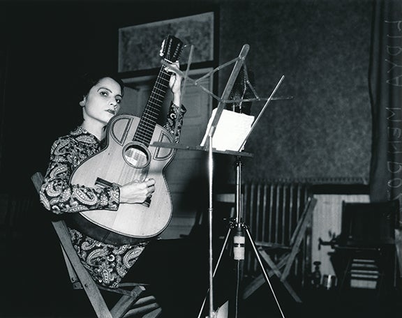 Lydia Mendoza recording for Bluebird Records in a San Antonio hotel room  c. 1936 San Antonio, Texas San Antonio Light Collection Institute of Texan Cultures at San Antonio R2018.1108.001